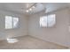 Finished basement area with neutral carpeting, recessed lighting and a window at 14656 W Vassar Dr, Lakewood, CO 80228