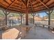 Charming gazebo with seating, provides a shaded retreat for gatherings and relaxation at 9556 W 89Th Cir, Broomfield, CO 80021