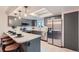 Bright kitchen featuring stainless steel appliances, and a breakfast bar with seating at 9556 W 89Th Cir, Broomfield, CO 80021