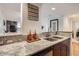Contemporary kitchen featuring granite countertops and a stainless steel sink at 1777 Larimer St # 1203, Denver, CO 80202