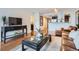 Comfortable living room featuring hard wood floors, stylish decor, and modern lighting at 1777 Larimer St # 1203, Denver, CO 80202