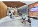 Modern lobby with decorative fireplace, comfortable furniture and elegant lighting at 1777 Larimer St # 1203, Denver, CO 80202