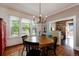 Bright dining room with natural light, hardwood floors, and comfortable seating at 1172 Harrison St, Denver, CO 80206
