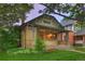 Charming brick home with covered porch and beautiful lawn at 1172 Harrison St, Denver, CO 80206