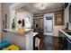 Open kitchen with a breakfast bar, stainless steel appliances, and modern finishes at 1172 Harrison St, Denver, CO 80206