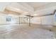 Spacious unfinished basement with concrete floor and exposed ceiling; ready to be renovated at 497 Valley Way, Bennett, CO 80102