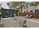 Charming backyard featuring a gravel area, outdoor seating, and a grill at 2424 N Clay St, Denver, CO 80211