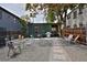 Backyard with gravel cover, patio, grill, and seating area at 2424 N Clay St, Denver, CO 80211