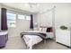 This bedroom features plenty of light, colorful decor and a ceiling fan at 23652 E 40Th Ave, Aurora, CO 80019