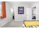 This bedroom features a connected closet and a view into another room at 23652 E 40Th Ave, Aurora, CO 80019