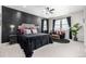 Comfortable bedroom with stylish accents, lots of natural light, and plush bedding at 23652 E 40Th Ave, Aurora, CO 80019