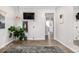 Clean and well lit bonus room with hardwood floors and muted colors is the perfect flex space at 23652 E 40Th Ave, Aurora, CO 80019