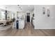 Open concept kitchen with an island, stainless steel appliances, and modern finishes at 23652 E 40Th Ave, Aurora, CO 80019