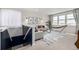 A cozy living room with a comfortable seating area, decorative art, and hammock at 23652 E 40Th Ave, Aurora, CO 80019