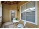 Inviting balcony with table and chairs for enjoying the views and outdoor living at 6021 W Castlegate Dr # E18, Castle Rock, CO 80108
