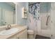 Bright bathroom with tub, shower and neutral-toned vanity offering a clean, fresh aesthetic at 6021 W Castlegate Dr # E18, Castle Rock, CO 80108