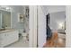 Well-lit bathroom featuring a single vanity, creating a functional and comfortable space at 6021 W Castlegate Dr # E18, Castle Rock, CO 80108