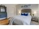 Inviting bedroom with a comfortable bed, offering a cozy and serene atmosphere for rest and relaxation at 6021 W Castlegate Dr # E18, Castle Rock, CO 80108