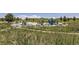 Wide outdoor panoramic view of a well-maintained playground in a neighborhood, a great place to bring the  at 1970 S Haleyville Way, Aurora, CO 80018