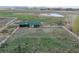 This is an aerial view of a barn surrounded by fencing at 6231 Prospect Rd, Longmont, CO 80503