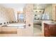 Luxurious bathroom with glass shower, soaking tub and designer finishes at 6231 Prospect Rd, Longmont, CO 80503