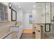 Updated bathroom featuring a shower and neutral countertop vanity at 6231 Prospect Rd, Longmont, CO 80503
