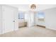 Neutral bedroom featuring ample natural light and standard closet at 6231 Prospect Rd, Longmont, CO 80503