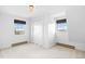 Neutral bedroom featuring ample natural light and standard closet at 6231 Prospect Rd, Longmont, CO 80503
