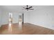 Living room with hardwood floors and view to kitchen at 6231 Prospect Rd, Longmont, CO 80503