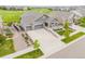 Beautiful aerial view highlighting the home's location within a golf course community and landscaped yard at 27375 E Alder Dr, Aurora, CO 80016