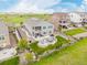 Spacious backyard view with a sunken fire pit and hot tub perfect for lounging and relaxation at 27375 E Alder Dr, Aurora, CO 80016