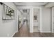 Bright and spacious hallway with stylish decor and hardwood floors at 27375 E Alder Dr, Aurora, CO 80016