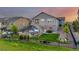 Large backyard with a well-maintained lawn, fencing, and outdoor entertainment areas, perfect for Gathering gatherings at 27375 E Alder Dr, Aurora, CO 80016
