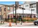 Fox and The Hen restaurant exterior featuring a large tented patio and brick building at 3211 Zuni St # 14, Denver, CO 80211
