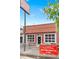 Highland Tap & Burger exterior showcasing outdoor seating, large windows, and vibrant signage at 3211 Zuni St # 14, Denver, CO 80211
