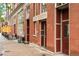 Charming red brick building showcasing architectural detail and inviting entrances at 3211 Zuni St # 14, Denver, CO 80211