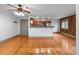 Spacious living room with breakfast bar and exposed brick at 3211 Zuni St # 14, Denver, CO 80211