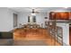 Bright living space with hardwood floors, open kitchen, and stylish decor at 3211 Zuni St # 14, Denver, CO 80211