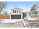 Charming two-story home with well-maintained lawn and attached two-car garage at 16820 Bitterbrush, Parker, CO 80134