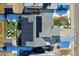 Aerial of a home with solar panels, showcasing the roof, backyard, and surrounding neighborhood at 7888 Tejon St, Denver, CO 80221
