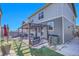 Backyard patio with pergola, seating area, and landscaping at 7888 Tejon St, Denver, CO 80221