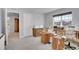 Comfortable bedroom with large windows, neutral walls, and plush carpeting at 7888 Tejon St, Denver, CO 80221