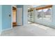Cozy bedroom with ample natural light, a mirrored closet, and neutral carpet at 1185 S Kramer Ct, Aurora, CO 80012