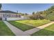 Spacious backyard with grassy lawn and a private fenced area at 1279 Leyden St, Denver, CO 80220