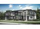 Modern townhome with stone accents and private patio at 14578 W 90Th Ln # C, Arvada, CO 80005