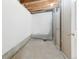 Unfinished basement area with open studs, concrete floor, and utility hookups at 3565 W 112Th Cir, Westminster, CO 80031