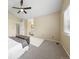 Large bedroom with carpet, ceiling fan, and ensuite bathroom at 3565 W 112Th Cir, Westminster, CO 80031