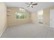 Bedroom with vaulted ceiling and attached ensuite bathroom at 3565 W 112Th Cir, Westminster, CO 80031