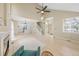 Bright living room boasts vaulted ceilings, a cozy fireplace, and easy access to the kitchen at 3565 W 112Th Cir, Westminster, CO 80031