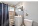 Bathroom featuring a vanity with a white countertop and a shower with a curtain at 120 Field St, Lakewood, CO 80226
